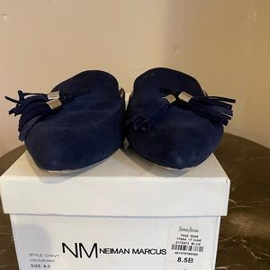 Neiman Marcus Sued Slides